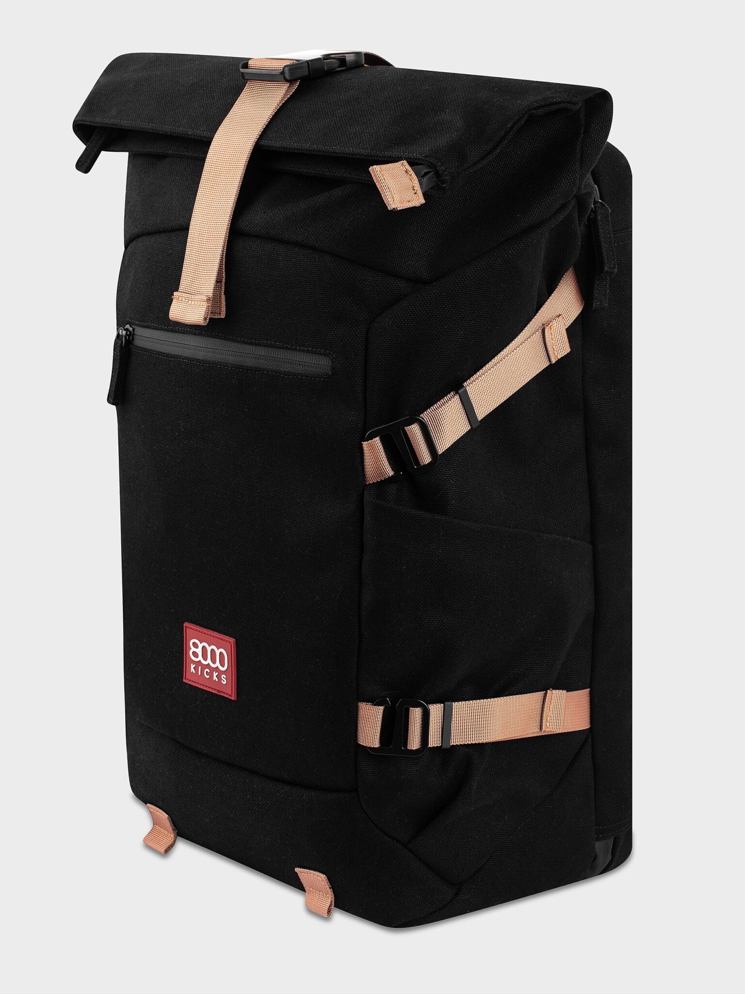 Black roll-top backpack with beige straps, side pockets, a front zipper pocket, and a red rectangular logo patch on the lower front, against a plain light background.