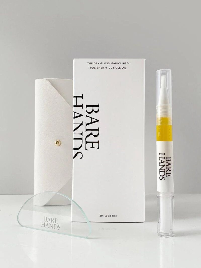 A Bare Hands manicure kit with a white case, glass tool, cuticle oil pen, and product box displayed on a white surface.
