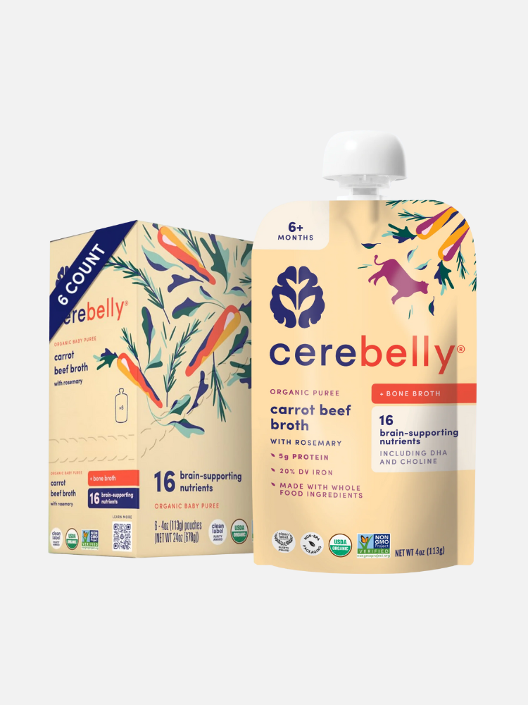 A box and pouch of Cerebelly Carrot Beef Broth for babies, featuring animal and vegetable illustrations, labeled with nutritional benefits for ages 6+ months.