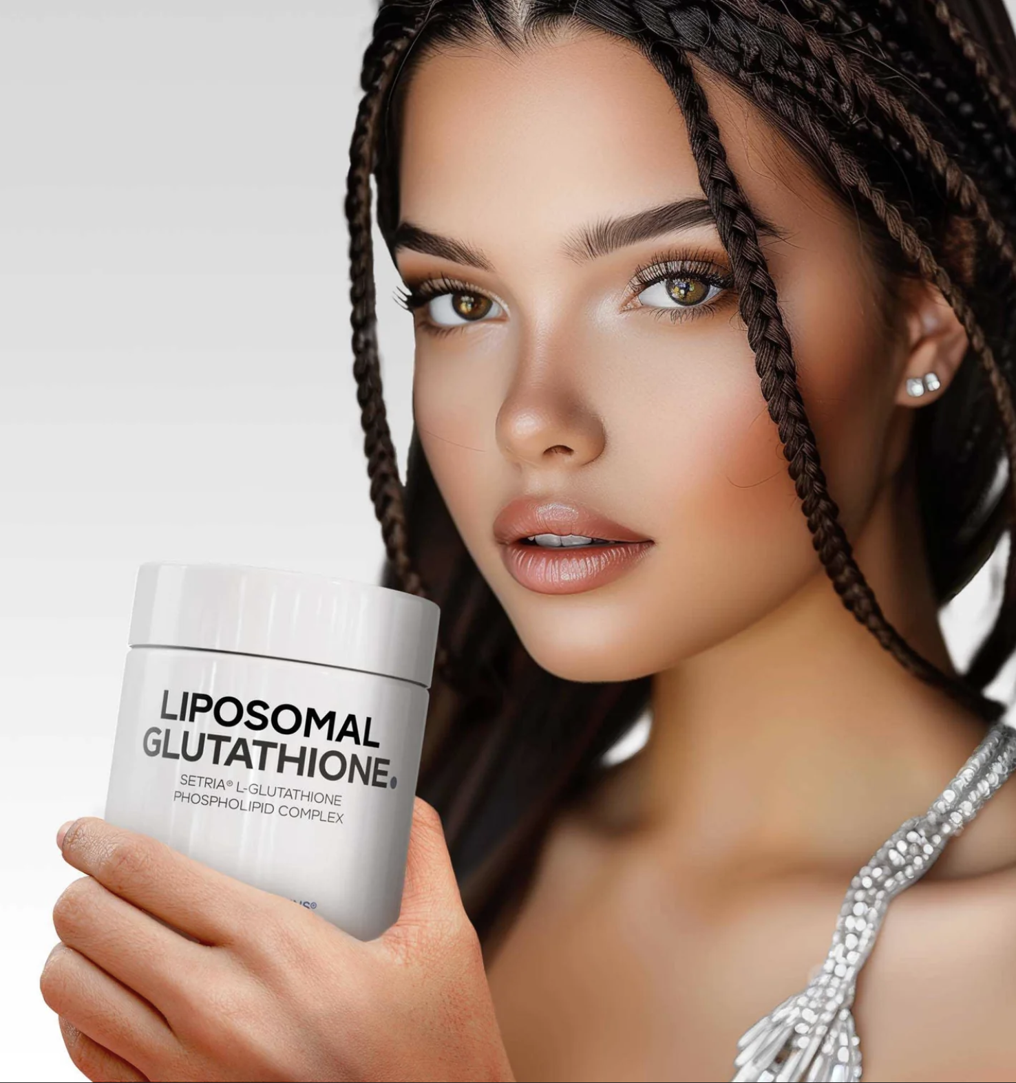 A woman with braided hair holds a container labeled "Liposomal Glutathione" and looks toward the camera.