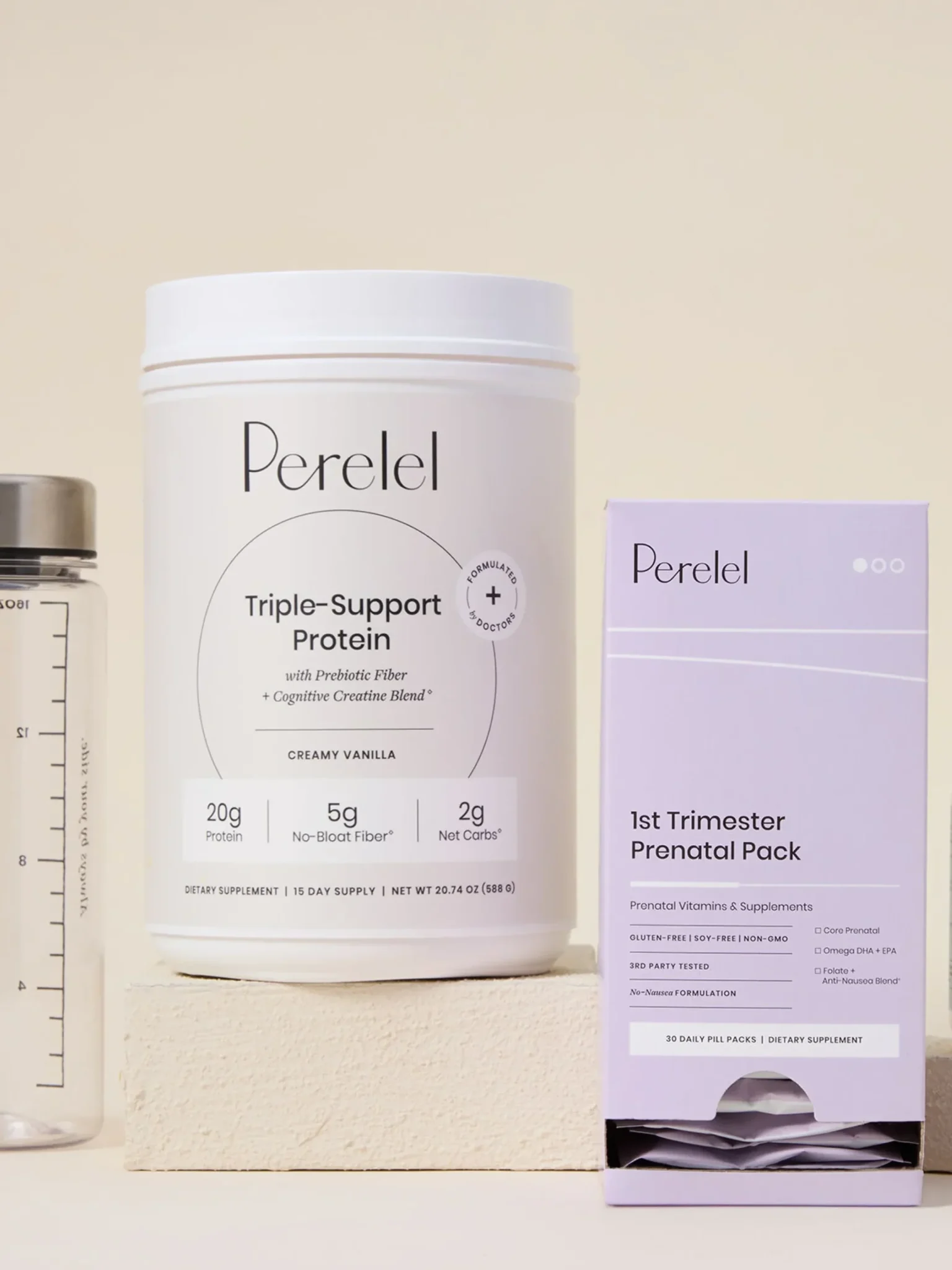 A water bottle, protein powder, prenatal supplement pack, and another container are displayed on beige blocks with text: "Free Water Bottle with Subscription!.