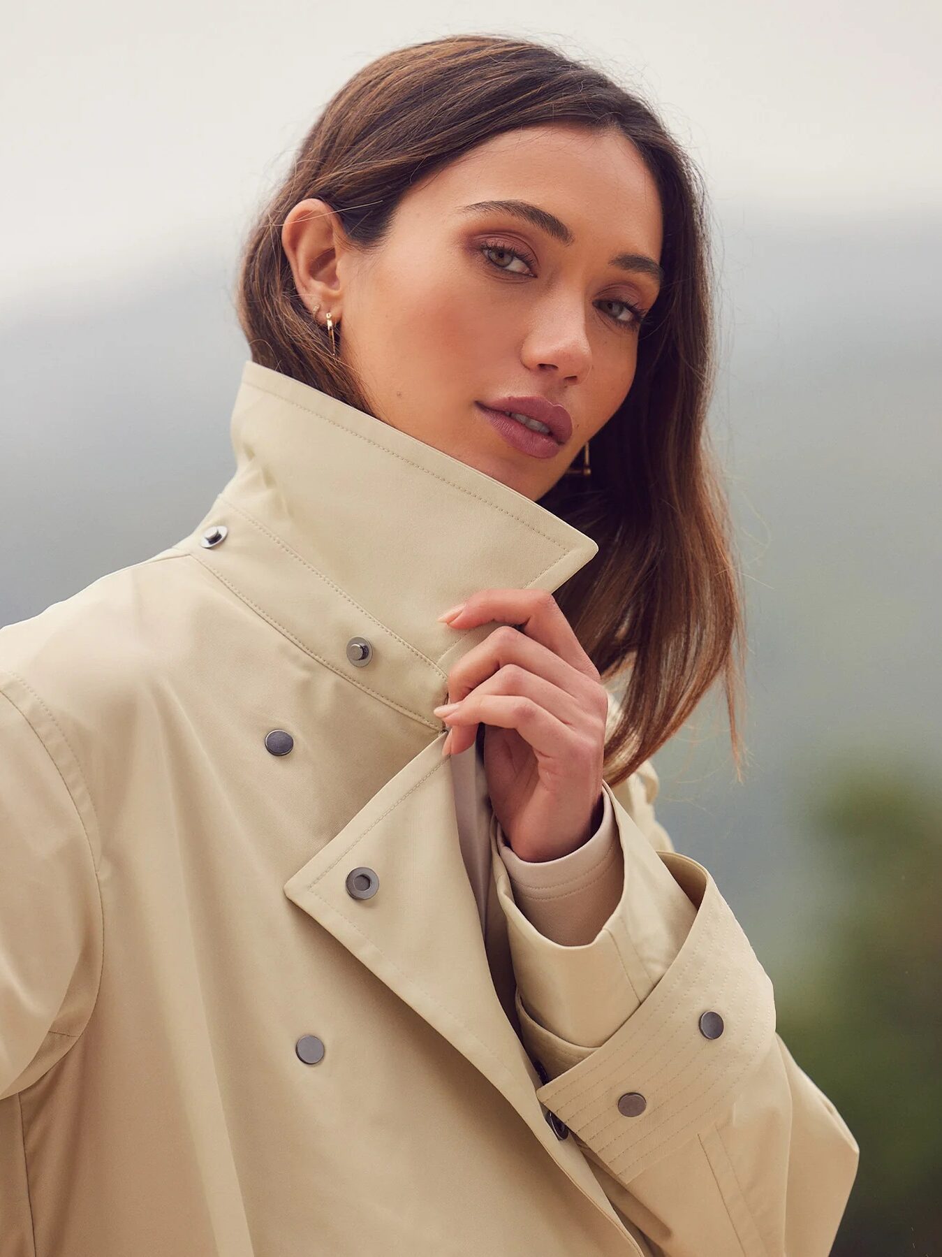 A woman posing for a picture.